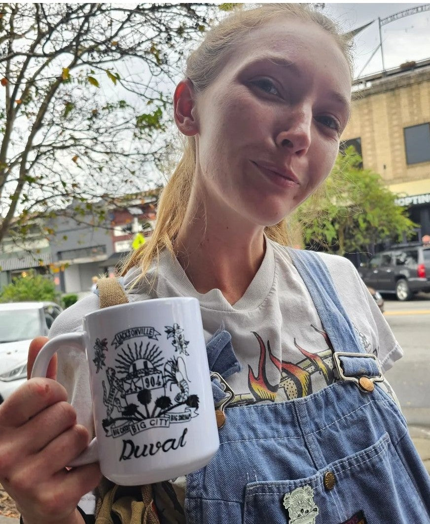 Duval Crest..... Join the Fam!&nbsp;  Show your 904 love &nbsp;each morning with&nbsp;Locally made XL white ceramic coffee mug&nbsp;  Microwave friendly -- Handle will not get super hot!  Comes in White with Black print or White with Teal Print &nbsp;- both sides of the handle