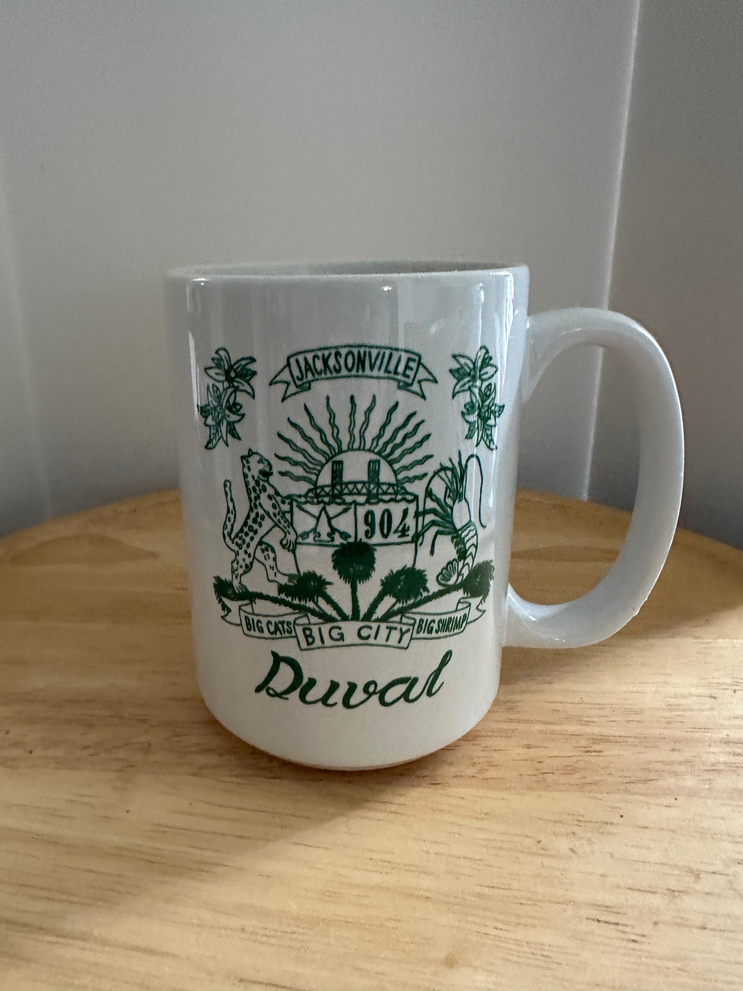 Taza de café XL con escudo de Duval 