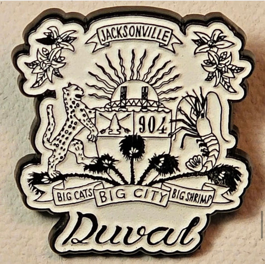 Duval Crest..... Join the Fam! Celebrate your love for the 904 with these classic jean jacket/ backpack pins in a throwback vibe of the 1980's.....  1"x1" metal pins.  Choose from the following color combos....  White Glow in the Dark with Black Lettering  Red with Green Lettering  Teal Glow in the Dark with Gold Lettering  Black with Silver Lettering