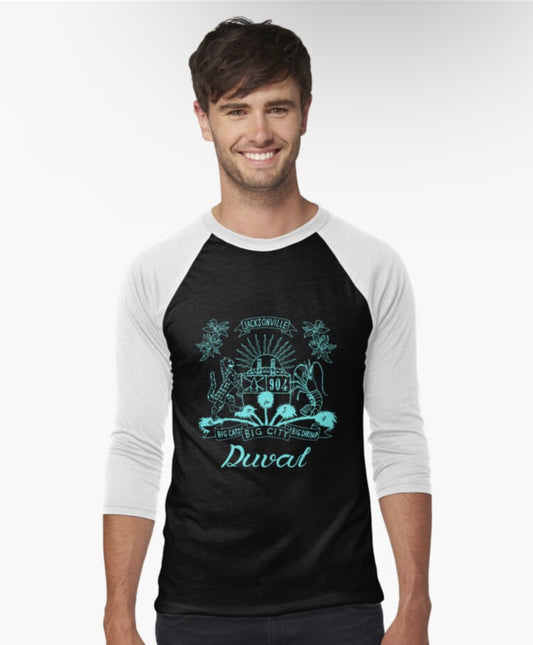 Duval Crest..... Join the Fam! Show your 904 love at any GAME OR ANY EVENT with this epic Baseball Tee.  White base, black sleeves, and teal print.  Product features That vintage athletic look, with contrast 3/4 baseball sleeves and collar Slim fit, but if that's not your thing, order a size up Male model shown is 6'1" / 185 cm tall and wearing size Large 52% ringspun cotton and 48% polyester