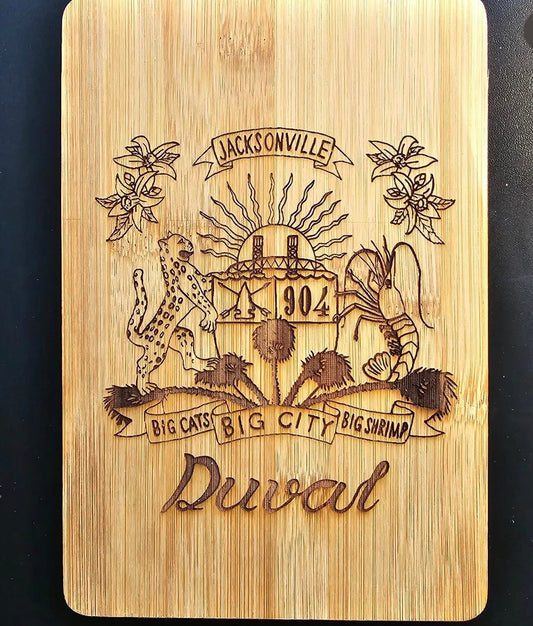 Duval Crest..... Join the Fam!   Show your 904 love with this mini cutting board  Material - wood  Size - 5 3/4" x 8 3/4 x 1/4"  This is great for picnics, boat outings, and camping trips