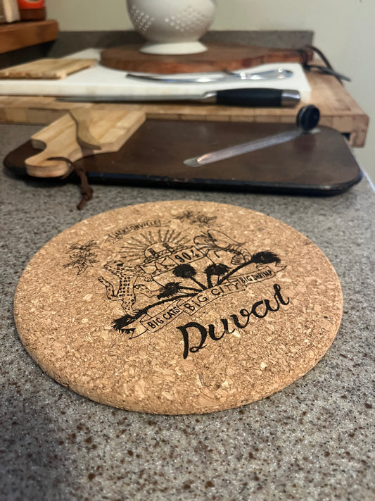 Duval Crest..... Join the Fam!   Show your 904 love on any table or surface with....  7" round cork trivet  Great for outdoor or indoor protection of table tops and surfaces against hot plates, pots and serving dishes.